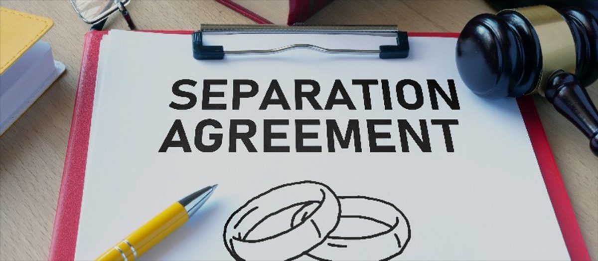 Separation agreement document with wedding rings